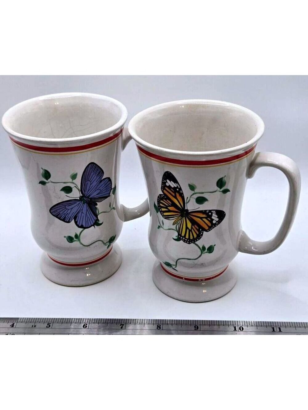 Pair of B.I. Inc. Footed Pedestal Coffee Mugs with Butterfly Motifs
